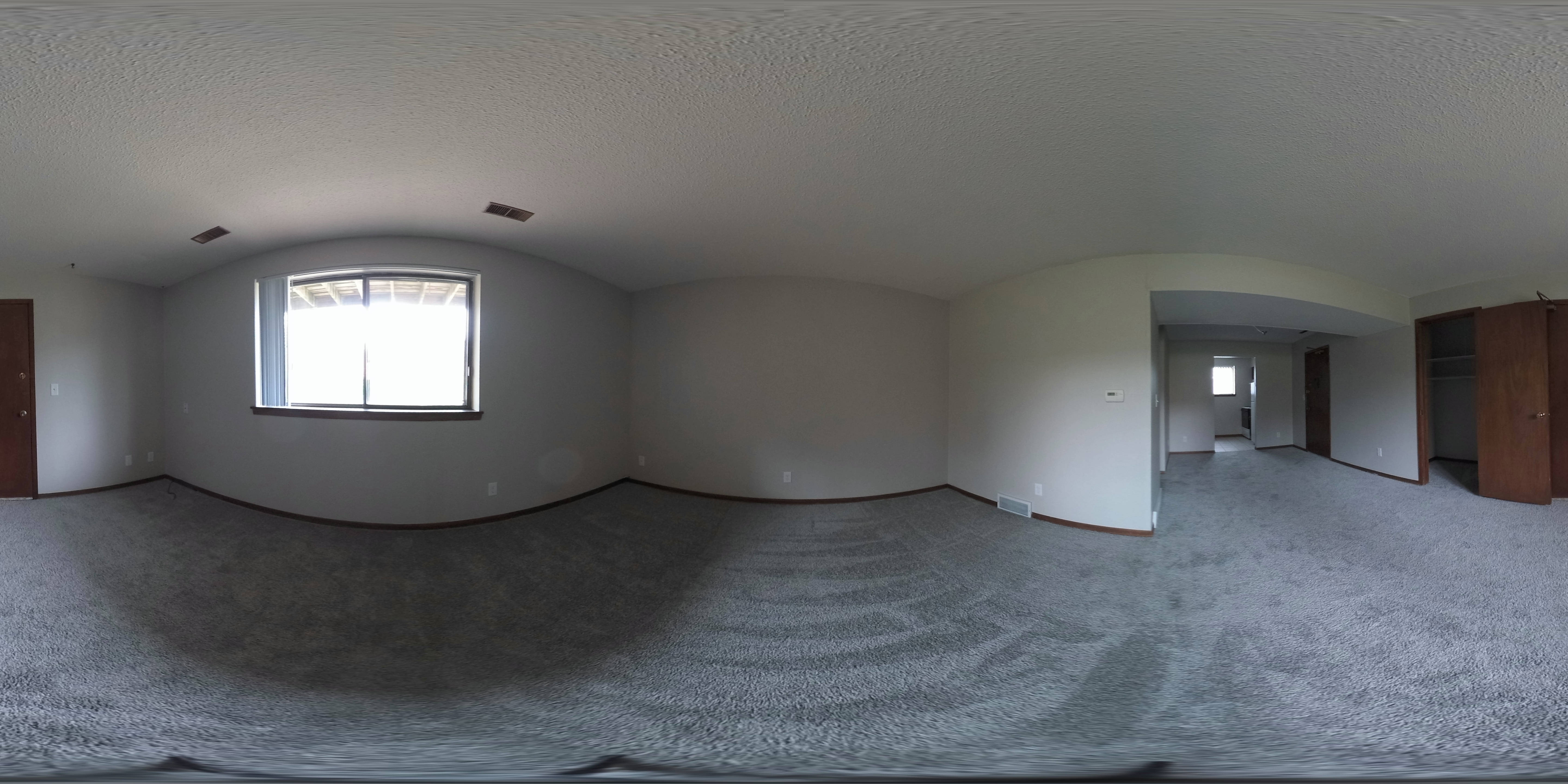 Spinning 360 image of an apartment living room